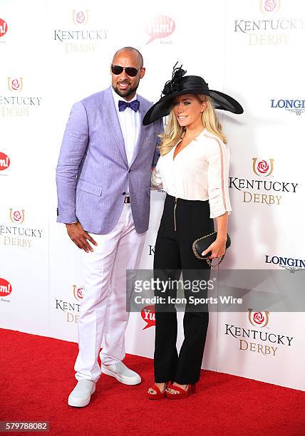 Hank Baskett and Kendra Wilkinson arrive on the red carpet at the 141st running of the Kentucky Derby at Churchill Downs in Louisville, KY.