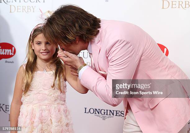 Larry Birkhead and his daughter, Dannielynn, age 8, arrive on the red carpet at the 141st running of the Kentucky Derby at Churchill Downs in...