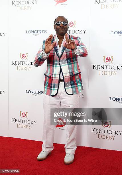 Singer Johnny Gill arrives on the red carpet at the 141st running of the Kentucky Derby at Churchill Downs in Louisville, KY.