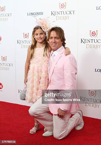 Larry Birkhead and his daughter, Dannielynn, age 8, arrive on the red carpet at the 141st running of the Kentucky Derby at Churchill Downs in...