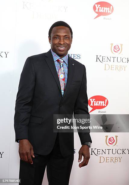 Former NBA player and new University of Alabama basketball coach Avery Johnson arrives on the red carpet at the 141st running of the Kentucky Derby...