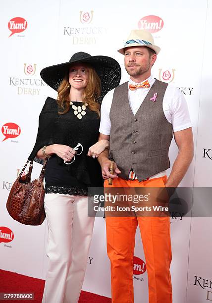 Actor Drew Water, with his wife, Heather, arrives on the red carpet at the 141st running of the Kentucky Derby at Churchill Downs in Louisville, KY.
