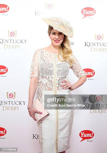 Emily West arrives on the red carpet at the 141st running of the Kentucky Derby at Churchill Downs in Louisville, KY.