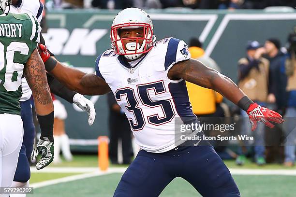 New England Patriots running back Jonas Gray spikes the football after scoring a touchdown during the fourth quarter of the game between the New York...
