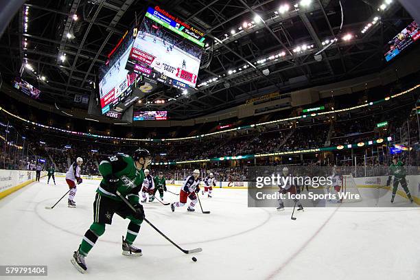 Texas Stars C Jason Dickinson plays the puck during the third period of the AHL hockey game between the Texas Stars and Lake Erie Monsters at Quicken...