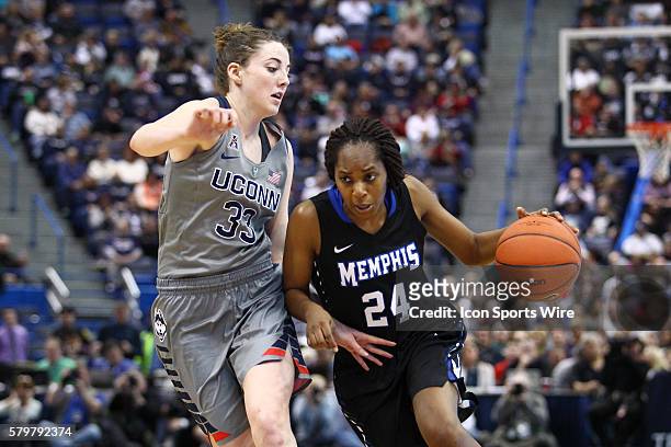 Memphis Guard Mooriah Rowser dribbles around UConn Huskies Guard Katie Lou Samuelson during an American Athletic Conference NCAA D1 women's...
