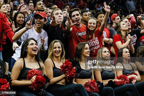 Louisville fans and cheerleaders react during the game against The Louisville Cardinals and North Carolina Tar Heels at The KFC Yum! Center in...