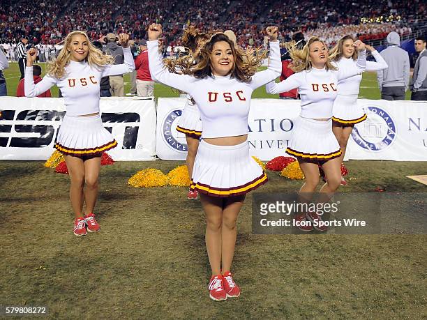 Trojans cheerleaders on the sidelines during the National University Holiday Bowl game against the Nebraska Cornhuskers played at Qualcomm Stadium in...