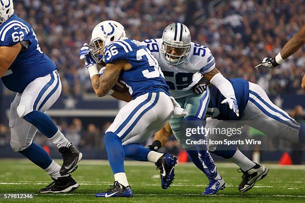 Dallas Cowboys Linebacker Anthony Hitchens [12329] brings down Indianapolis Colts Running Back Dan Herron [17658] during the NFL game between the...