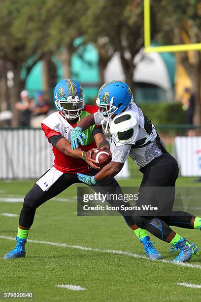 Deondre Francois of Orlando, FL hands the ball off to Damien Harris of Berea, KY during the 2014 Under Armour All-American practice at Disney's ESPN...