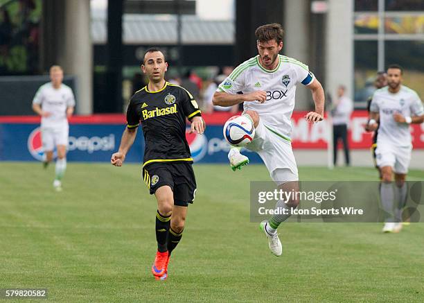 May 09, 2015; Brad Evans of the Seattle Sounders FC controls the ball in the air during the first half of the game between the Columbus Crew SC and...