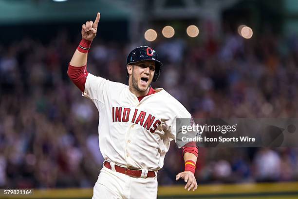 Cleveland Indians Catcher Yan Gomes [7599] celebrates as he rounds the bases after Cleveland Indians Outfield Jerry Sands [7467] hit a pinch hit...