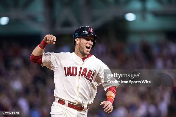 Cleveland Indians Catcher Yan Gomes [7599] celebrates as he rounds the bases after Cleveland Indians Outfield Jerry Sands [7467] hit a pinch hit...