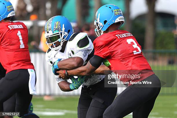 Deondre Francois of Orlando, FL hands the ball off to Damien Harris of Berea, KY during the 2014 Under Armour All-American practice at Disney's ESPN...