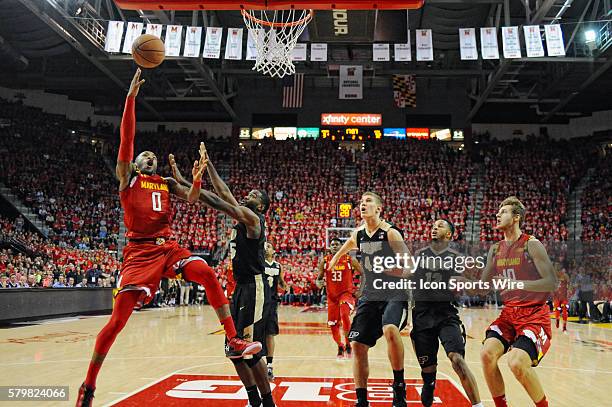 Maryland Terrapins guard Rasheed Sulaimon scores against Purdue Boilermakers guard Rapheal Davis at the Xfinity Center in College Park, MD. Where the...