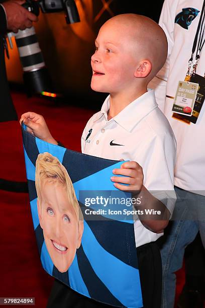 Braylon Beam a 6 year old Denver NC boy battling brain cancer arrives on the Red Carpet with his Ellen DeGeneres flag for the 5th Annual NFL Honors...