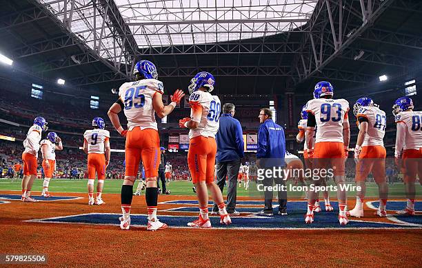 Boise State Broncos tight end Holden Huff talks with Boise State Broncos tight end Jake Roh before the Vizio Fiesta Bowl game between the Arizona...