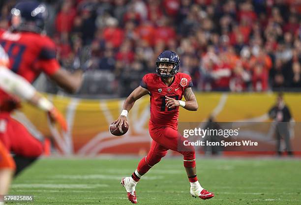 Arizona Wildcats quarterback Anu Solomon runs during the first half of the Vizio Fiesta Bowl game between the Arizona Wildcats and the Boise State...