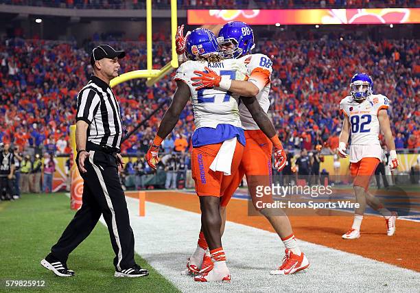 Boise State Broncos running back Jay Ajayi celebrates a first quarter touchdown with tight end Jake Roh during the first half of the Vizio Fiesta...