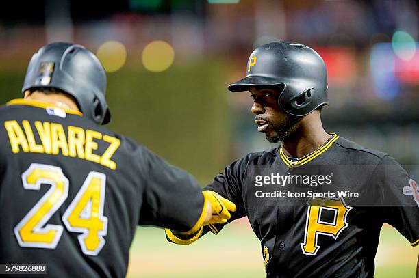Pittsburgh Pirates center fielder Andrew McCutchen celebrates with Pittsburgh Pirates first baseman Pedro Alvarez during the MLB game between the...