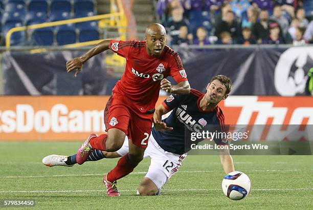 Toronto FC midfielder Collen Warner gets past New England Revolution midfielder Andy Dorman . The New England Revolution and Toronto FC played to a...