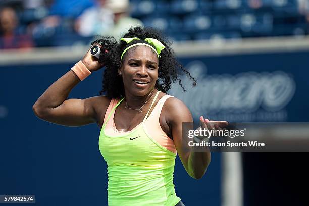 Serena Williams of the United States reacts during her match against Flavia Pennetta of Italy on day 2 of the Rogers Cup at the Aviva Centre in...