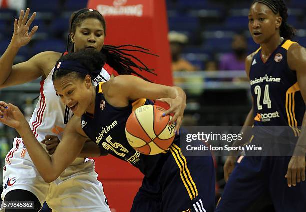 Indiana Fever guard Marissa Coleman pushes past Washington Mystics guard Tierra Ruffin-Pratt during a WNBA game at Verizon Center, in Washington D.C....