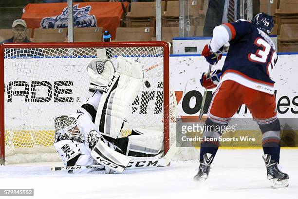 Manchester Monarchs goaltender Jean-Francois Berube makes an incredible save on Hartford Wolf Pack Right Wing Ryan Haggerty . The Manchester Monarchs...