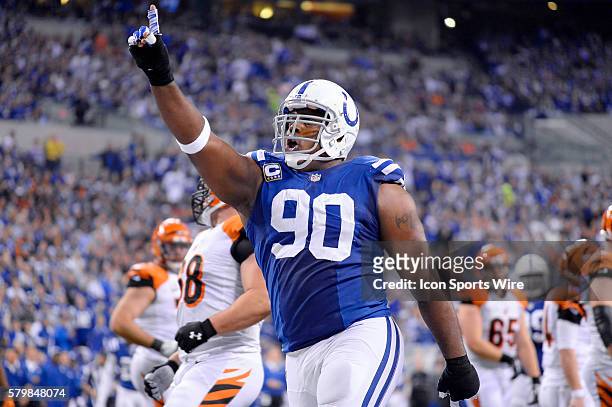 Indianapolis Colts defensive end Cory Redding celebrates after a play in action during the NFL AFC Wild Card football game between the Indianapolis...
