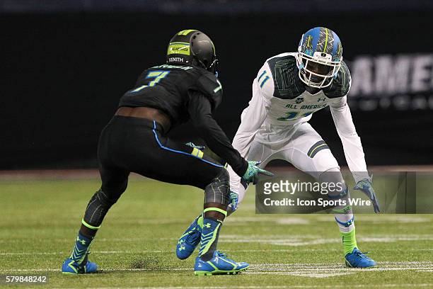 Team Highlight wide receiver George Campbell and Team Armour defensive back Kevin Toliver II in action during the 2015 Under Armour All-America Game...