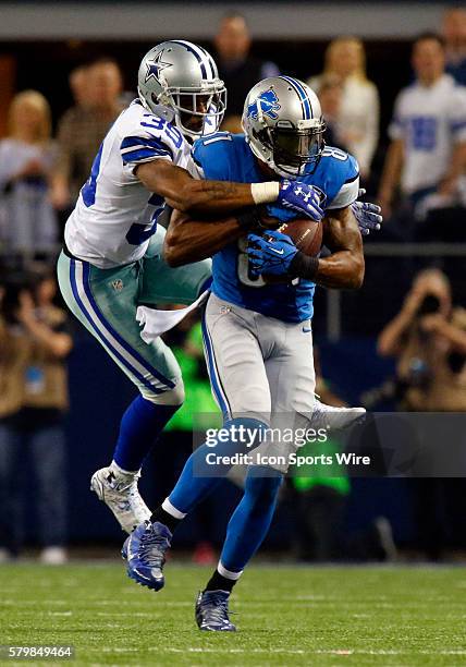 Detroit Lions wide receiver Calvin Johnson makes the catch infront of Dallas Cowboys cornerback Brandon Carr during the second half of a NFC...