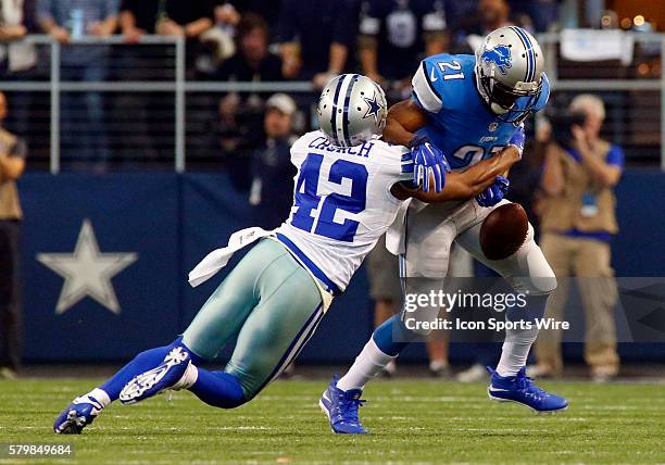 Dallas Cowboys strong safety Barry Church forces the fumble on Detroit Lions running back Reggie Bush during the first quarter NFC Wild-Card game...