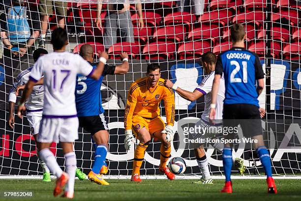Orlando City FC goalkeeper Tally Hall prepares to gather a loose ball, during the game between the San Jose Earthquakes and Orlando City FC at Levi's...
