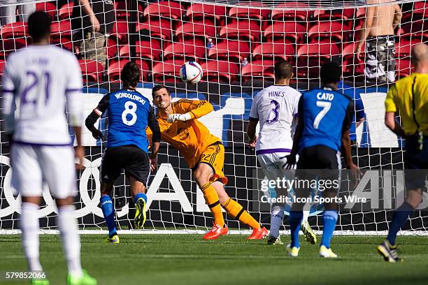 San Jose Earthquakes forward Chris Wondolowski takes a shot as Orlando City FC goalkeeper Tally Hall defends, during the game between the San Jose...