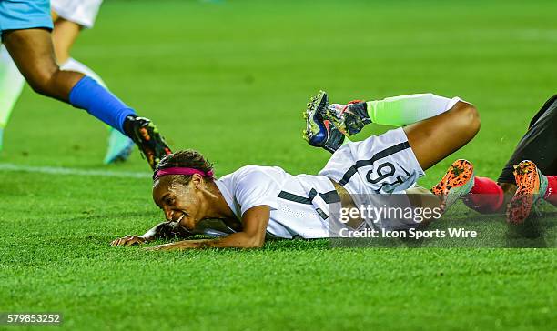 United States Forward Crystal Dunn reacts to barely missing a second half goal during the Women's Olympic qualifying soccer match between USA and...