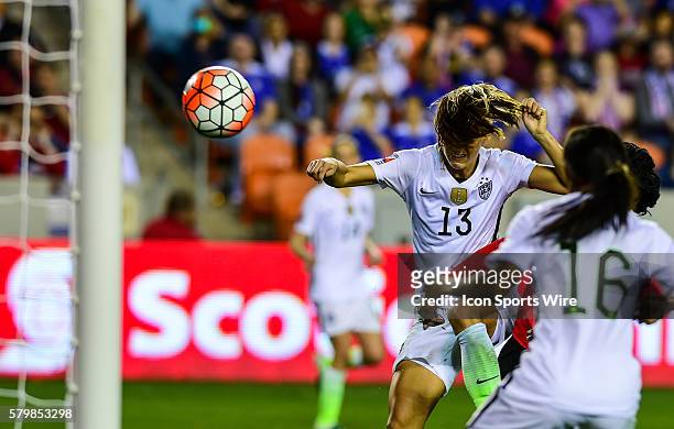 United States Forward Alex Morgan hits a header for a goal during the Women's Olympic qualifying soccer match between USA and Trinidad & Tobago at...