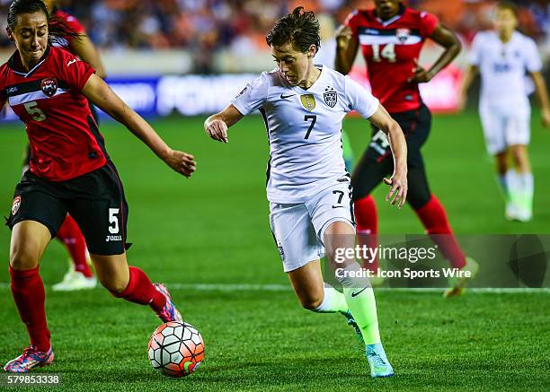 United States Defender Meghan Klingenberg maneuvers through traffic during the Women's Olympic qualifying soccer match between USA and Trinidad &...