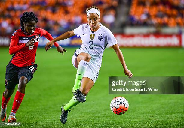 United States Forward Mallory Pugh and Trinidad & Tobago Midfielder Khadidra Debesette fight for the ball during the Women's Olympic qualifying...