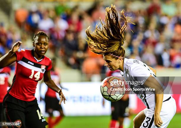 United States Forward Alex Morgan hits a header for a shot on goal during the Women's Olympic qualifying soccer match between USA and Trinidad &...