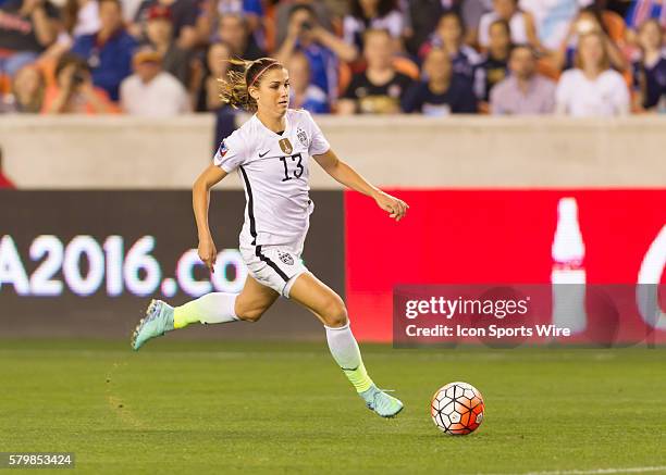 Forward Alex Morgan scored a hat trick during the Women's Olympic semi-final qualifying match between USA and Trinidad & Tobago at BBVA Compass...