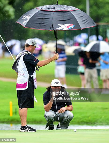 Pat Perez lines up a putt on during final round action of the Crowne Plaza Invitational at Colonial in Ft. Worth, Texas.