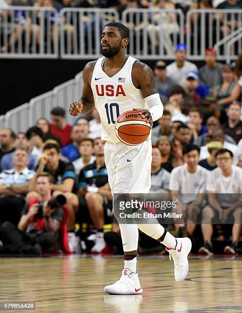 Kyrie Irving of the United States brings the ball up the court against Argentina during a USA Basketball showcase exhibition game at T-Mobile Arena...
