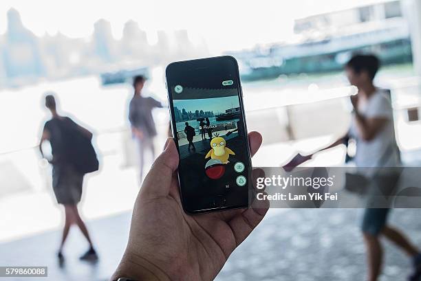 Pokemon species Psyduck is seen in the Pokemon Go game on July 25, 2016 in Tsim Sha Tsui, Hong Kong. "Pokemon Go," which has been a smash-hit across...