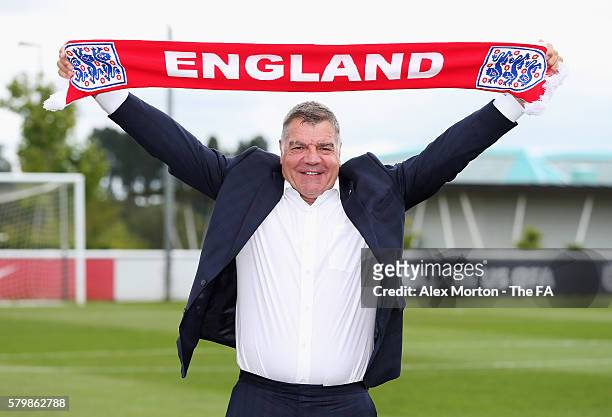 Newly appointed England manager Sam Allardyce poses after a press conference at St. George's Park on July 25, 2016 in Burton-upon-Trent, England.