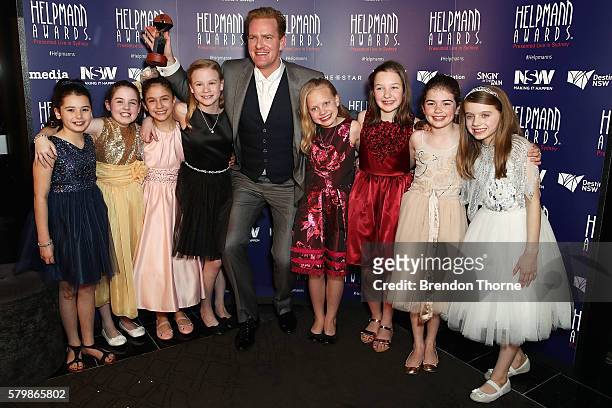 James Millar winner of Best Male Actor in a Musical poses with the Best Female Actor Award recipients, the cast of Matilda in the awards room at 16th...