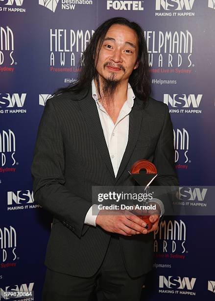 Kimball Wong poses with the award for Best Male Dancer in a Dance or Physical Theatre Work in a Musical in the awards room at the 16th Annual...