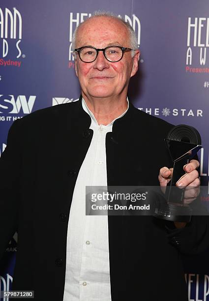 Michael Lynch poses with the Sue Nattrass Award in the awards room at the 16th Annual Helpmann Awards at Lyric Theatre, Star City on July 25, 2016 in...