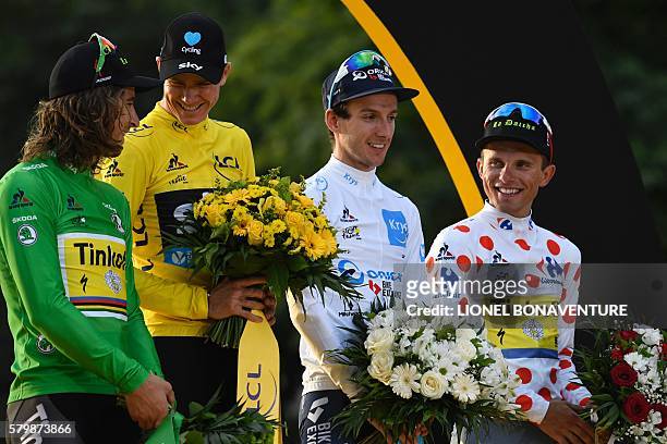 Tour de France 2016's winner Great Britain's Christopher Froome wearing the overall leader's yellow jersey, Slovakia's Peter Sagan , wearing the best...