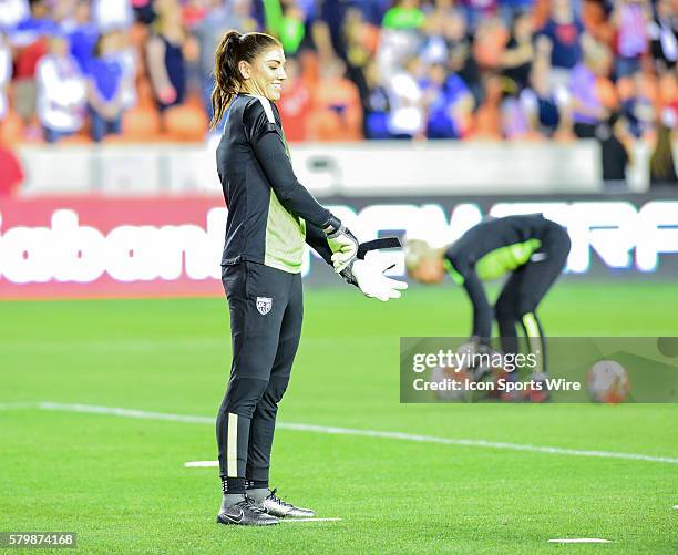 United States Goalkeeper Hope Solo dons her gloves before the Women's Olympic qualifying soccer match between USA and Trinidad & Tobago at BBVA...