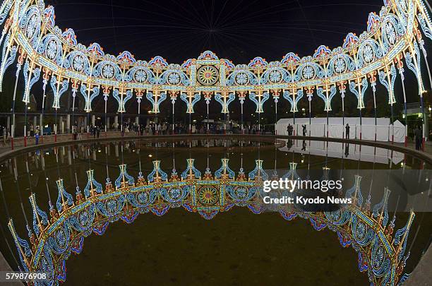 Japan - Illuminations surrounding a fountain, an artwork titled ''fountain of prayer'' and created to wish for the reconstruction of tsunami-hit...